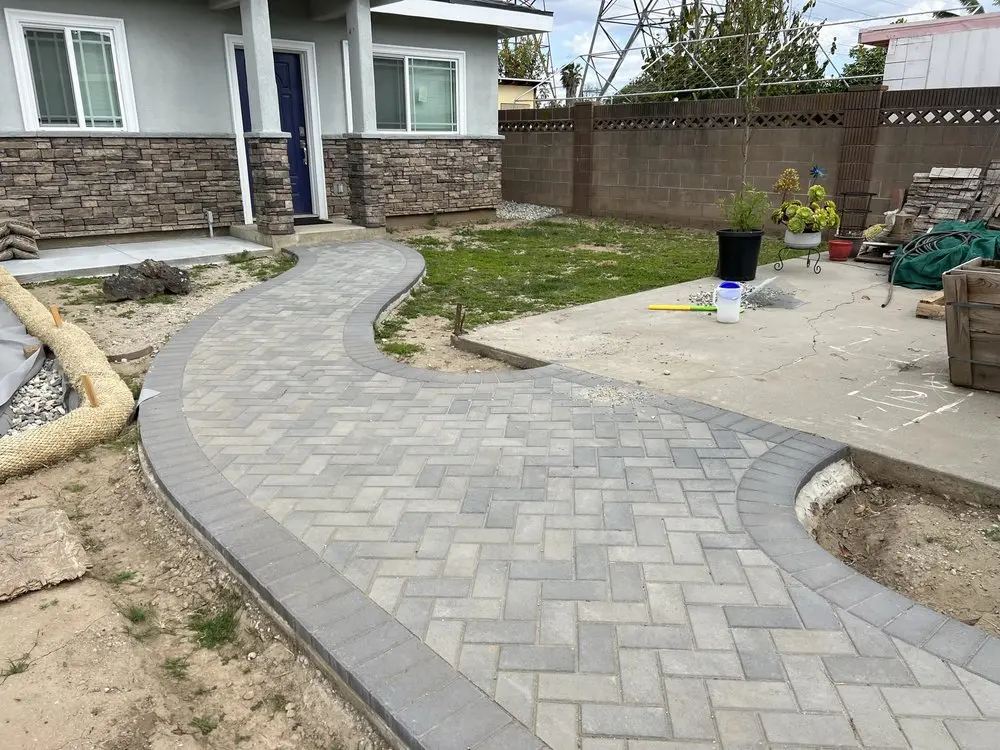 Curved paver garden walkway